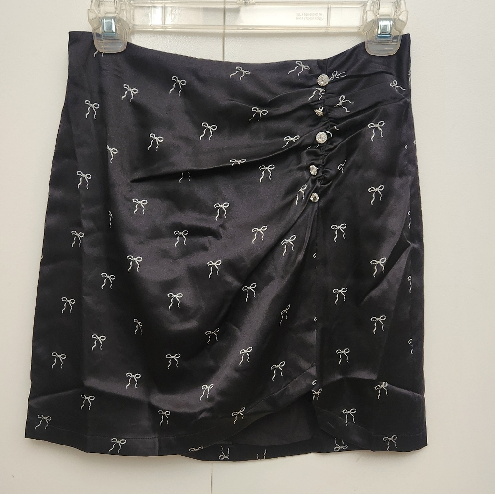 Black Mini Skirt With Bow Tie Pattern